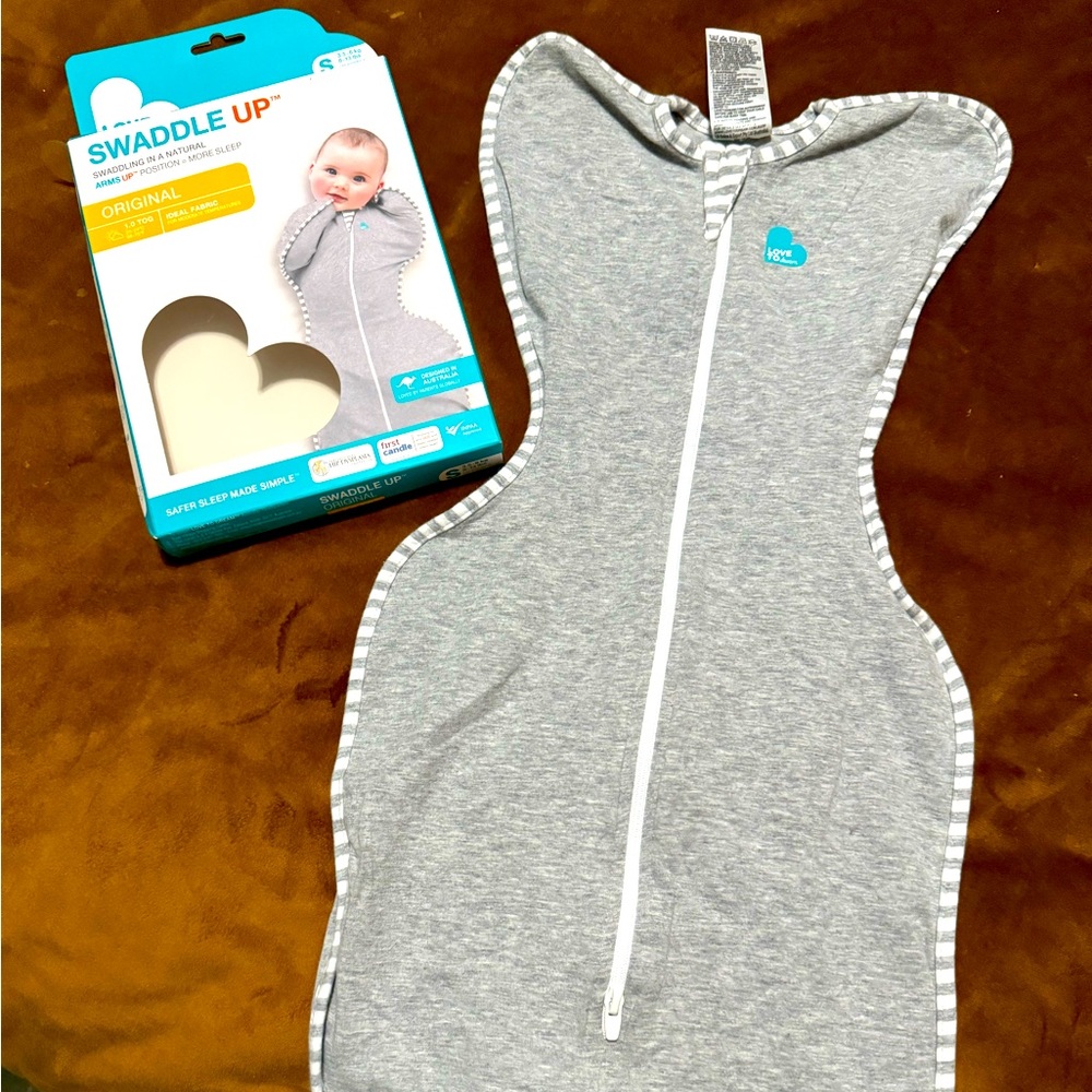 Love to Dream Swaddle. Size small. Great used condition with original box.